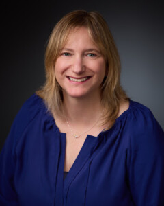Butler Award winnter Joan Petit, wearing a blue shirt