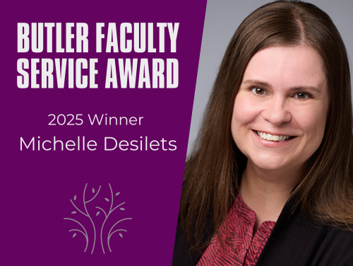 Photo of Butler Award Winner Michelle Desilets on a grey background 