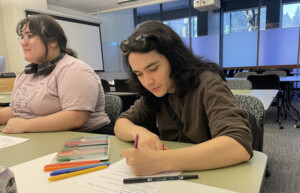 Students drawing as part of a brainstorming exercise