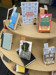 An oval library book display and a sign that says Award Winning Books